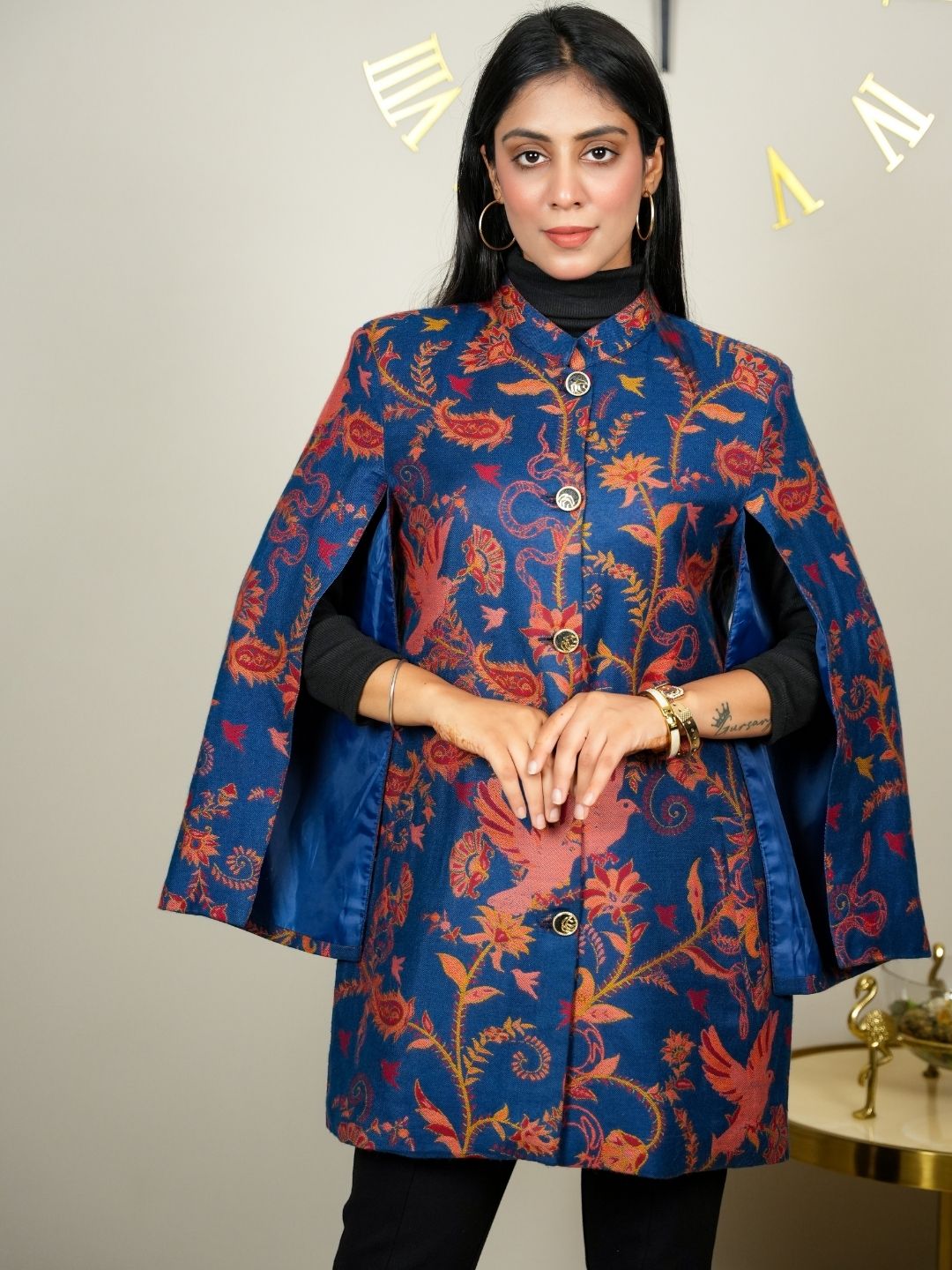 Charming Blue Cape Coat with Artistic Motifs